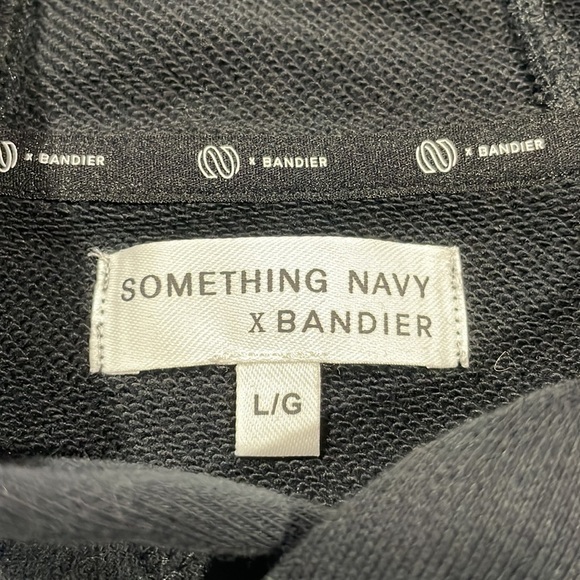 Bandier x Something Navy Cropped Pullover Hoodie in Black - Picture 3 of 12